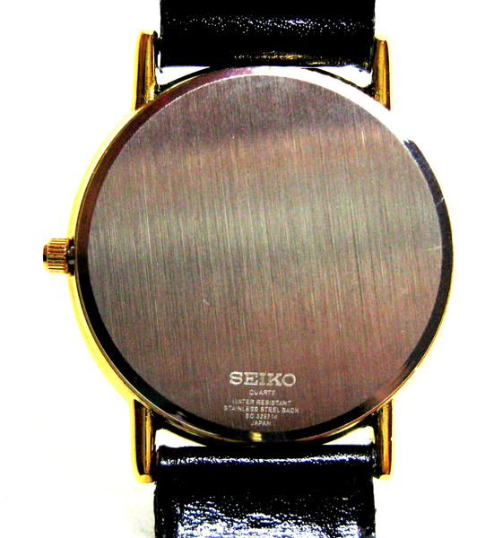 Seiko Quartz Slim Round Mens Wrist Watch Simple Dial New Battery Japan Made Mint