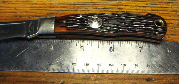 Rare A.G. RUSSELL USA Vintage 2001 TEXAS RANGERS Bone Folding Knife & Sheath